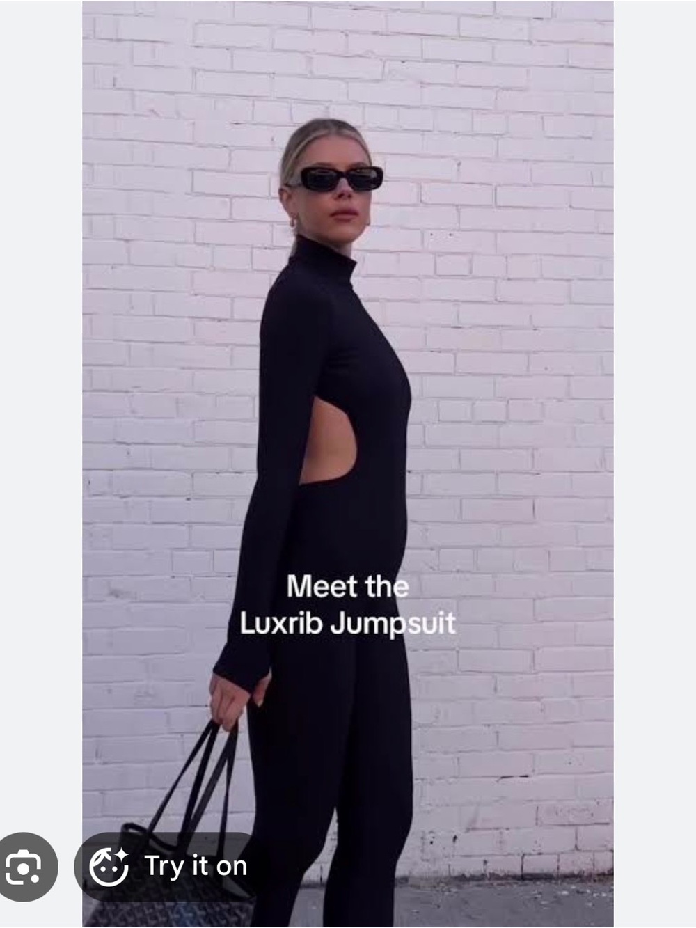 NAMA open back jump suit size S like new